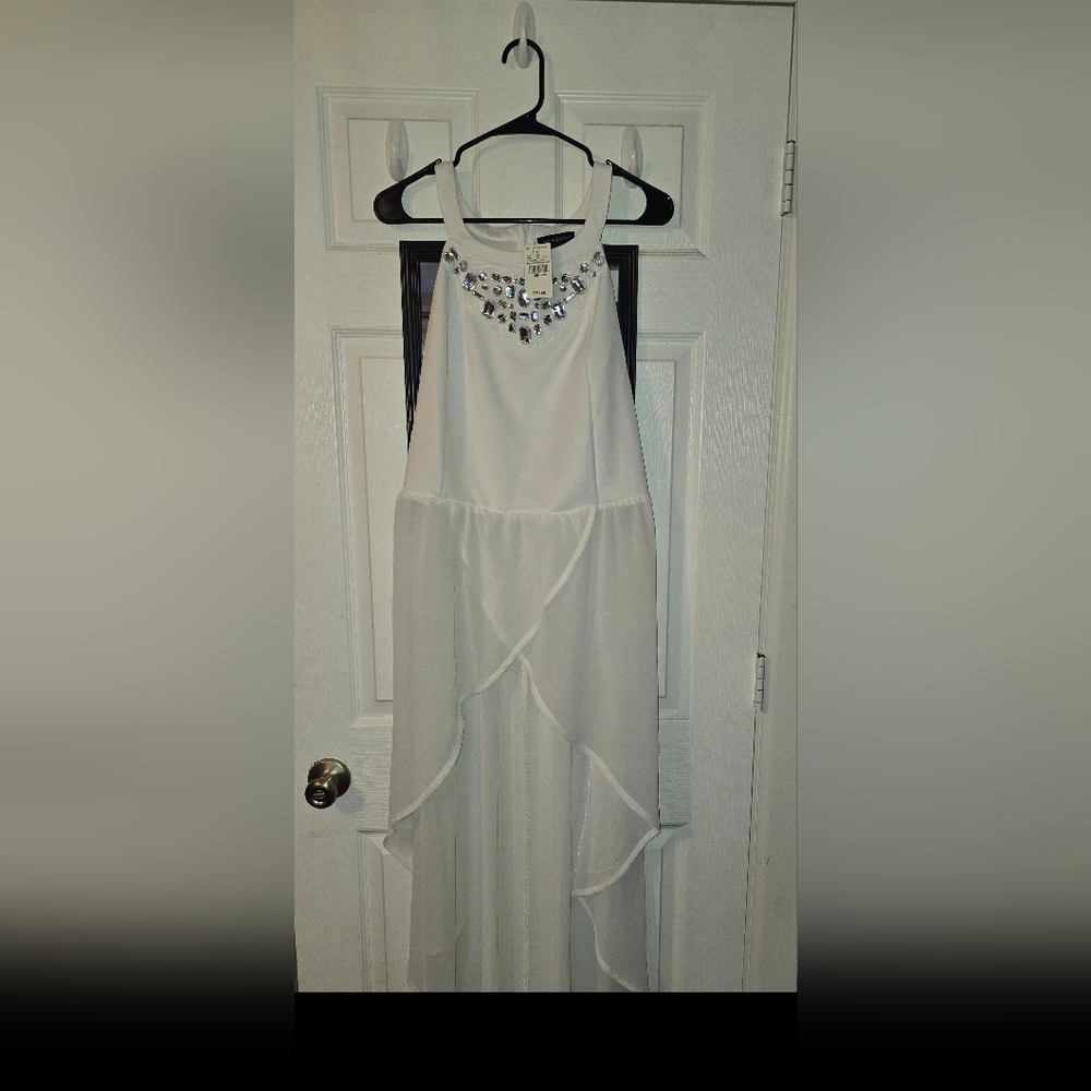 NWT Ashley Stewart High- Low Top Size